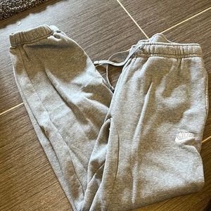 Grey Nike sweatpants with pocket on back